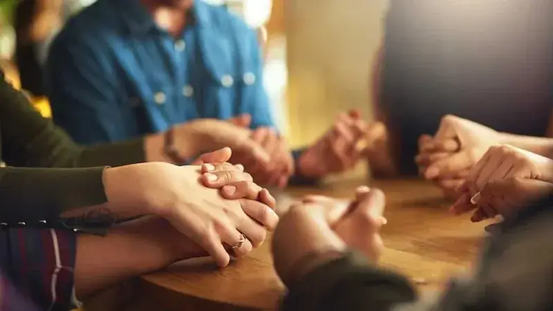 Hero image with people holding hands